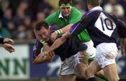 18 February 2000; Don Mackinnon of Scotland is tackled by Dion O'Cuinneagain of Ireland during the Six Nations A Rugby Championship match between Ireland and Scotland at Donnybrook Stadium in Dublin. Photo by Brendan Moran/Sportsfile