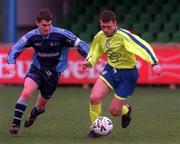 12 March 2000; Don Tierney of Finn Harps in action against Ciaran Kavanagh of UCD during the Eircom League Premier Division match between UCD and Finn Harps at Belfield Park in Dublin. Photo by David Maher/Sportsfile