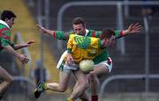 25 March 2000; Donal Curtis of Meath in action against Colm McManamon of Mayo during the Church & General National Football League Division 1B Round 6 match between Meath and Mayo at Páirc Tailteann in Navan, Meath. Photo by Ray Lohan/Sportsfile