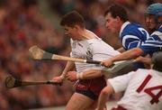 17 March 2000; Donal Moran of Athenry is tackled by Ger Hoey, 2, and Donal Cahill of St Joseph's Doorabarefield during the AIB All-Ireland Senior Club Hurling Championship Final match between Athenry and St Joseph's Doorabarefield at Croke Park in Dublin. Photo by Ray McManus/Sportsfile