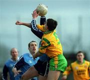 5 March 2000; Declan Darcy of Dublin gathers possession ahead of Mark Crossan of Donegal during the Church & General National Football League Division 1A Round 5 match between Dublin and Donegal at Parnell Park in Dublin. Photo by Ray McManus/Sportsfile