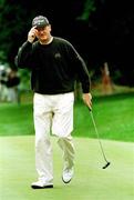 1 July 1999; Eamonn Darcy tips his hat after putting a birdie on the 2nd green during day one the Murphy's Irish Open at Druids Glen in Wicklow. Photo by Matt Browne/Sportsfile