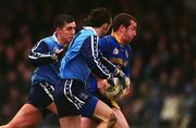 16 January 2000; Enda Barden of Longford in action against Jonathan Magee, behind, and Stephen Cowap of Dublin during the O'Byrne Cup Semi-Final match between Longford and Dublin at Pearse Park in Dublin. Photo by Damien Eagers/Sportsfile