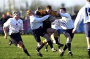 4 december 1999; Eoin Brennan of Buccaneers, is tackled by Anthony Horgan, left, and Cian Mahony of Cork Constitution during the AIB Rugby League Division 1 match between Buccaneers and Cork Constitution at Buccaneers RFC in Athlone, Westmeath. Photo by Matt Browne/Sportsfile