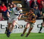 12 March 2000; Fergal Hartley of Waterford in action against Charlie Carter of Kilkenny during the Allianz National Hurling League Division 1B Round 3 match between Kilkenny and Waterford at Nowlan Park in Kilkenny. Photo by Ray McManus/Sportsfile