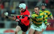 31 October 1999; Johnny Enright of UCC gets past Fergal Ryan of Blackrock during the Cork County Senior Club Hurling Championship Final match between Blackrock and UCC at Páirc Uí Chaoimh in Cork. Photo by Brendan Moran/Sportsfile