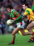 25 March 2000; James Gill of Mayo in action against Hank Traynor of Meath during the Church & General National Football League Division 1B Round 6 match between Meath and Mayo at Páirc Tailteann in Navan, Meath. Photo by Ray Lohan/Sportsfile