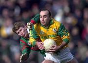 25 March 2000; Jody Devine of Meath in action against Kevin Cahill of Mayo during the Church & General National Football League Division 1B Round 6 match between Meath and Mayo at Páirc Tailteann in Navan, Meath. Photo by Damien Eagers/Sportsfile