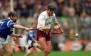17 March 2000; Joe Rabitte of Athenry is tackled by  Darragh O'Driscoll of St Joseph's Doorabarefield during the AIB All-Ireland Senior Club Hurling Championship Final match between Athenry and St Joseph's Doorabarefield at Croke Park in Dublin. Photo by Ray McManus/Sportsfile
