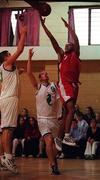 7 November 1999; Joseph Haastrup of Tolka Rovers in action against Eamonn Sheehan, left, and Niall O'Sullivan of Waterford Crystal during the ESB Men's Superleague Basketball match between Tolka Rovers and Waterford Crystal at Griffith Avenue in Dublin. Photo by Brendan Moran/Sportsfile