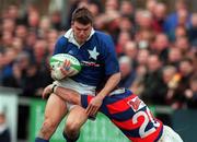 12 March 2000; John McWeeney of St Mary's College is tackled by David O'Brien of Clontarf during the AIB Rugby League Division 1 match between Clontarf and St Mary's College at Templeville Road in Dublin. Photo by Matt Browne/Sportsfile
