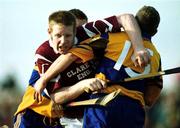 24 October 1999; Kenneth Kennedy of St Joseph's Doora/Barefield in action against Niall Gilligan and David Chaplin, right, of Sixmilebridge during the Clare County Senior Club Hurling Championship Final match between Sixmilebridge and St Joseph's Doora Barefield at at Hennessy Park, Miltown Malbay, Clare. Photo by Ray McManus/Sportsfile
