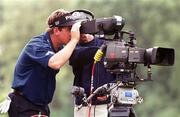31 July 1999; Lee Westwood checks TV footage in a TV Camera after a collision of two golf balls on the 2nd green which had to be replaced during day two of the Smurfit European Open at the K-Club in Straffan, Kildare. Photo by Matt Browne/Sportsfile