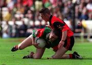 26 September 1999; Gary Dillon of Mayo in action against Mark Doran of Down during the All-Ireland Minor Football Championship Final match between Down and Mayo at Croke Park in Dublin. Photo by Matt Browne/Sportsfile