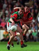 26 September 1999; Gavin Duffy of Mayo in action against Liam Doyle of Down during the All-Ireland Minor Football Championship Final match between Down and Mayo at Croke Park in Dublin. Photo by Matt Browne/Sportsfile