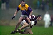 27 November 1999; Gerard O'Malley of Crossmolina in action against Alan Nolan of Roscommon Gaels during the AIB Connacht Senior Club Football Championship Final Replay match at St Tiernan's Park in Crossmolina, Mayo. Photo by David Maher/Sportsfile
