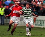 12 January 2000; Gino Brazil of Shamrock Rovers is tackled by Ollie Cahill of Cork City during the FAI Cup Second Round Replay match between Cork City and Shamrock Rovers at Turners Cross in Cork. Photo by Matt Browne/Sportsfile