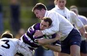 25 March 2000; Girvan Dempsey of Terenure is tackled by Cian Mahony, right, and John Kelly of Cork Constitution during the AIB All-Ireland League Division 1 match between Cork Constitution and Terenure at Temple Hill in Cork. Photo by Brendan Moran/Sportsfile
