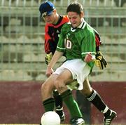 22 November 1999; Graham Barrett of Republic of Ireland beats Liechtenstein goalkeeper Peter Jehle to score the second of his two goals during the UEFA Under 18 Championship Preliminary Round match between Republic of Ireland and Liechenstein at the National Stadium in Ta' Qali, Malta. Photo by David Maher/Sportsfile