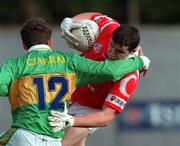 30 October 1999; Graham Canty of Cork in action against John McGlynn of Kerry during the Church & General National Football League Division 1A Round 1 match between Cork and Kerry at Páirc Uí Rinn in Cork. Photo by Brendan Moran/Sportsfile