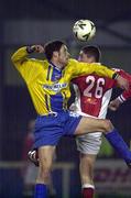 17 December 1999; Graham O'Hanlon of Bohemians in action against Colin Hawkins of St Patrick's Athletic during the Eircom National League Premier Division match between St Patrick's Athletic and Bohemians at Richmond Park in Dublin. Photo by Ray McManus/Sportsfile