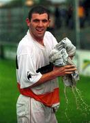 25 September 1999; Greg O'Halloran of Cork City squeezes the water from his shirt after referee Hugh Byrne called off the game due to a waterlogged pitch. Eircom League Premier Division match between Cork City and UCD at Turners Cross in Cork. Photo by David Maher/Sportsfile