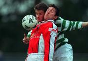 16 January 2000; Marcus Hallows of St Patrick's Athletic in action against Richie Purdy of Shamrock Rovers during the Eircom League Premier Division match between Shamrock Rovers and St Patrick's Athletic at Morton Stadium in Santry, Dublin. Photo by David Maher/Sportsfile