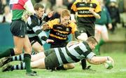 27 March 1999; Marcus Horan of Shannon, supported by team-mate Simon Johnson, goes over to score his side's first try despite the tackle of Eoin Brennan of Buccaneers during the AIB All-Ireland League Division 1 match between Buccaneers and Shannon at Buccaneers RFC in Athlone, Westmeath. Photo by Matt Browne/Sportsfile