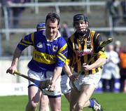 26 March 2000; Michael Ryan of Tipperary under pressure from Stephen Grehan of Kilkenny during the Church & General National Hurling League Division 1B Round 4 match between Tipperary and Kilkenny at Nowlan Park in Kilkenny. Photo by Ray McManus/Sportsfile