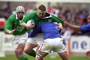 18 March 2000; Paul Wallace of Ireland is tackled by Eric Bertrand and Laurent Pedrosa of France during the Six Nations A Rugby Championship match between France and Ireland at Stade Marcel-Michelin in Clermont-Ferrand, France. Photo by Matt Browne/Sportsfile