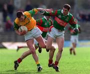 25 March 2000; Richie Kealy of Meath in action against Stephen Carolan of Mayo during the Church & General National Football League Division 1B Round 6 match between Meath and Mayo at Páirc Tailteann in Navan, Meath. Photo by Ray Lohan/Sportsfile
