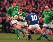 4 March 2000; Ronan O'Gara, Ireland, supported by team-mates Anthony Foley, left, and Keith Wood in action against Diego Dominguez of Italy during the Lloyds TSB 6 Nations match between Ireland and Italy at Lansdowne Road in Dublin. Photo by Damien Eagers/Sportsfile