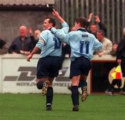 17 March 2000; Stephen Geoghegan of Shelbourne, left, celebrates with team-mate Richie Baker after he scored his side's first goal during the Eircom League Premier Division match between St Patrick's Athletic and Shelbourne at Richmond Park in Dublin. Photo by David Maher/Sportsfile