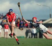 26 March 2000; Timmy McCarthy of Cork in action against Waterford's Johnny Brenner of Waterford during the Church & General National Hurling League Division 1B Round 4 match between Waterford and Cork at Walsh Park in Waterford. Photo by Aoife Rice/Sportsfile
