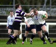 25 March 2000; Ultan O'Callaghan of Cork Constitution holds off the tackle of John Campbell of Terenure during the AIB All-Ireland League Division 1 match between Cork Constitution and Terenure at Temple Hill in Cork. Photo by Brendan Moran/Sportsfile