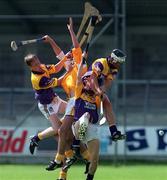 24 July 1999; Action from the during the All-Ireland Minor Hurling Championship Quarter-Final match between Antrim and Wexford at Parnell Park in Dublin. Photo by Ray Lohan/Sportsfile