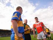 30 September 2007; Referee Stephen Tierney, flips a coin between Padraig Jones, left, captain of Dromard, and Francis Kavanagh, captain of Colmcille, before the start of the game. Longford Senior Football Championship Final, Dromard v Colmcille, Pearse Park, Longford. Picture credit; David Maher / SPORTSFILE