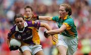 23 September 2007; Mary Lacey, Wexford, in action against Eileen Donoghue, Leitrim. TG4 All-Ireland Ladies Intermediate Football Championship Final, Wexford v Leitrim, Croke Park, Dublin. Picture credit; Matt Browne / SPORTSFILE