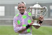 22 January 2015; Jockey Ruby Walsh with the Thyestes Cup after winning the Goffs Thyestes Handicap Steeplechase on Djakadam. Gowran Park, Gowran, Co. Kilkenny. Picture credit: Matt Browne / SPORTSFILE