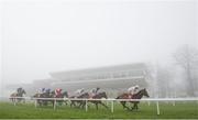 22 January 2015; The runners and riders make their way past the main stand on a foggy day at Gowran Park during the Langton House Hotel Maiden Hurdle. Gowran Park, Gowran, Co. Kilkenny. Picture credit: Matt Browne / SPORTSFILE