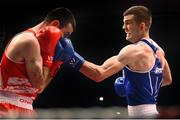 23 January 2015; Adam Nolan, right, Bray Boxing Club, exchanges punches with John Joe Joyce, St. Michaels Boxing Club, during their 69 kg bout. National Elite Boxing Championship Finals. National Stadium, Dublin. Picture credit: Cody Glenn / SPORTSFILE