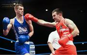 23 January 2015; Adam Nolan, left, Bray Boxing Club, exchanges punches with John Joe Joyce, St. Michaels Boxing Club, during their 69 kg bout. National Elite Boxing Championship Finals. National Stadium, Dublin. Picture credit: Cody Glenn / SPORTSFILE