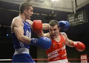 23 January 2015: Adam Nolan, left, Bray Boxing Club, evades a punch by John Joe Joyce, St. Michael's Boxing Club, Athy, during their 69kg bout. National Elite Boxing Championship Finals, National Stadium, Dublin. Picture credit: Ray Lohan / SPORTSFILE
