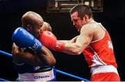 23 January 2015; Darren O'Neill, right, Paulstown Boxing Club, Kilkenny, exchanges punches with Ken Okungbowa, Athlone Boxing Club, during their 91 kg bout. National Elite Boxing Championship Finals. National Stadium, Dublin. Picture credit: Cody Glenn / SPORTSFILE