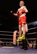 23 January 2015; Dean Walsh, St. Josephs Boxing Club/St. Ibans Boxing Club, Wexford, jumps in celebration after being declared winner over Ray Moylette, St. Annes Boxing Club, Mayo, after their 64 kg bout. National Elite Boxing Championship Finals. National Stadium, Dublin. Picture credit: Cody Glenn / SPORTSFILE