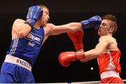 23 January 2015; Dean Walsh, right, St. Josephs Boxing Club/St. Ibans Boxing Club, Wexford, exchanges punches with Ray Moylette, St. Annes Boxing Club, Mayo, during their 64 kg bout. National Elite Boxing Championship Finals. National Stadium, Dublin. Picture credit: Cody Glenn / SPORTSFILE