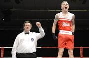 23 January 2015: Dean Walsh, St.Josephs/St.Ibars Boxing Club, Wexford, celebrates after victory over Ray Moylette, St.Annes, Mayo, 64kg bout. National Elite Boxing Championship Finals, National Stadium, Dublin. Picture credit: Ray Lohan / SPORTSFILE