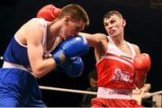 23 January 2015; Sean McComb, right, Holy Trinity Boxing Club, Belfast, exchanges punches with George Bates, St. Marys Boxing Club, Dublin, during their 60 kg bout. National Elite Boxing Championship Finals. National Stadium, Dublin. Picture credit: Cody Glenn / SPORTSFILE
