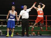 23 January 2015: Myles Casey, St. Francis Boxing Club, Limerick, celebrates victory over Evan Metcalfe, Crumlin Boxing Club, Dublin after their 52Kg bout. National Elite Boxing Championship Finals, National Stadium, Dublin. Picture credit: Ray Lohan / SPORTSFILE