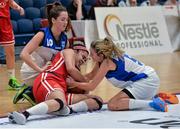 24 January 2015; Tia Kelly-Stevens, DCU Mercy, in action against Eva Roach, left, and Hollie Herlihy, Glanmire BC. Basketball Ireland Women's U18 National Cup Final, DCU Mercy v Glanmire BC, National Basketball Arena, Tallaght, Dublin. Picture credit: Piaras O Midheach / SPORTSFILE